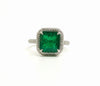 New Classic Halo Diamond Ring with Emerald in 18k white gold