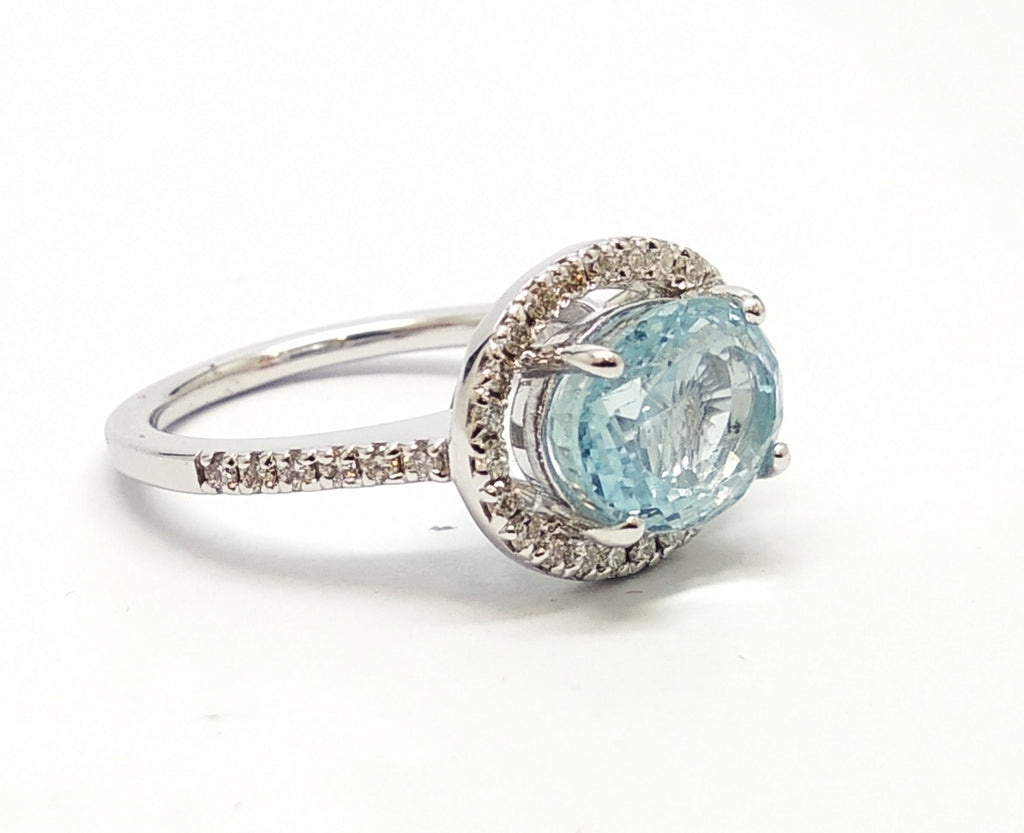 Oval Aquamarine With Round Diamond Halo Ring AD.NO- 2095