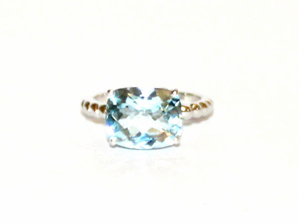 East And West Blue Topaz Ring